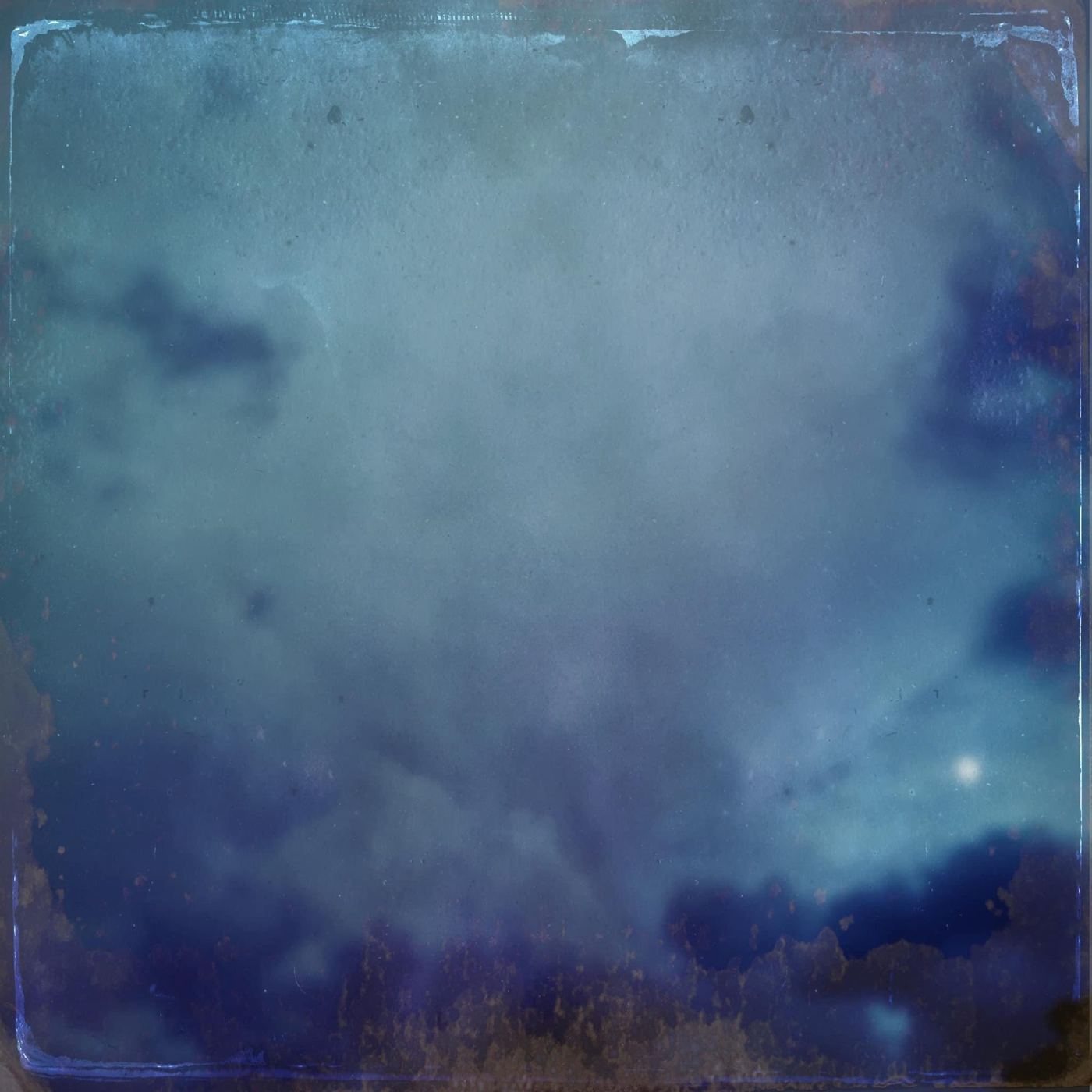 Blue sky clouding over